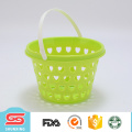 Mini cesta de fruta plástica circular portátil del hogar con diseño hueco